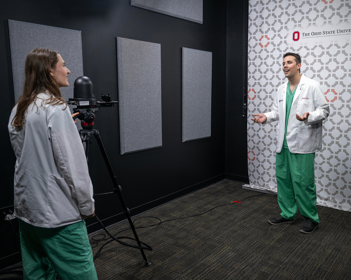 Medical physician talking and facing the camera.